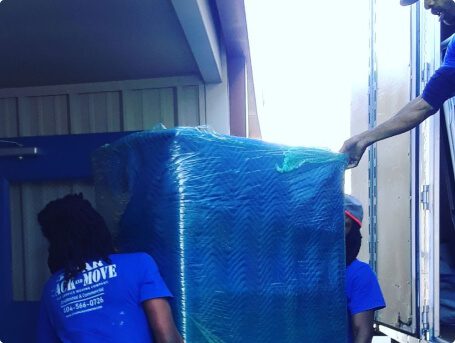 Movers moving piano